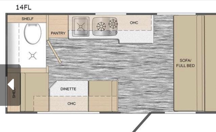 and bright wood-panel walls.|Inside a modern RV rental: light wood-look interior walls