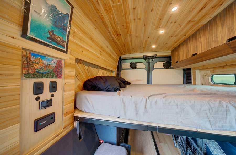 and bike storage.|RV rental: Rear view of a custom camper van
