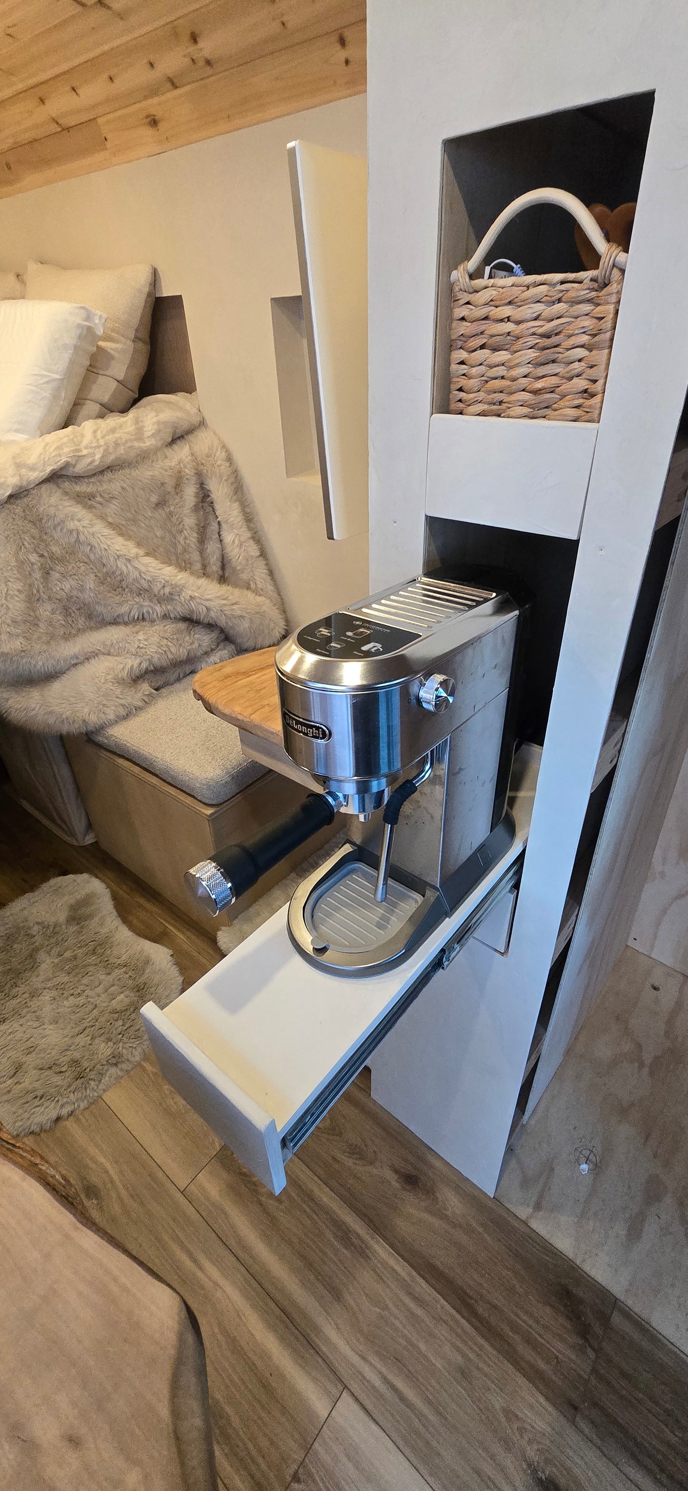 RV rental with a convenient De'Longhi espresso machine on a pull-out shelf. Enjoy gourmet coffee in this cozy, compact space.