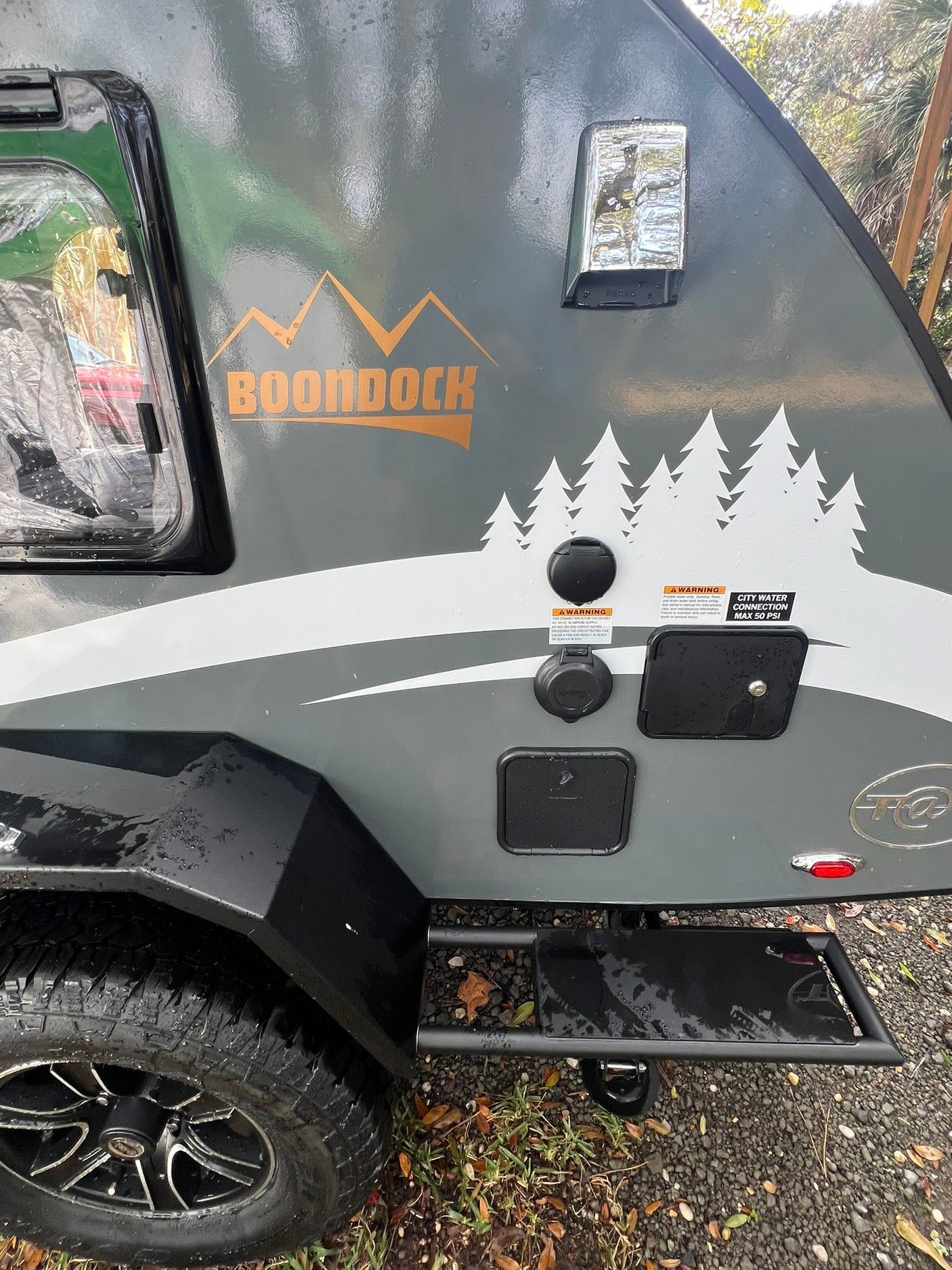 parked outdoors.|RV rental interior featuring two comfortable beds