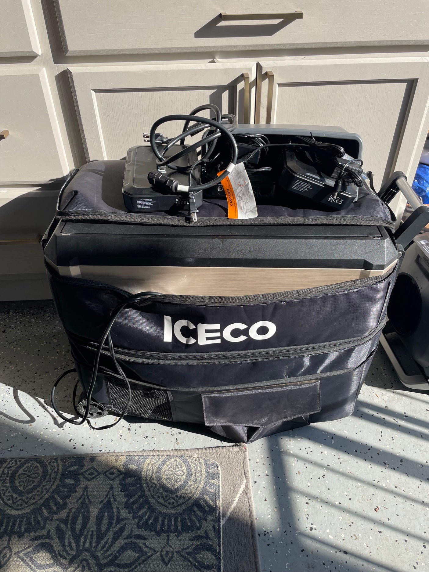 ICECO portable fridge/freezer with accessories, ready for your next rv rental adventure.