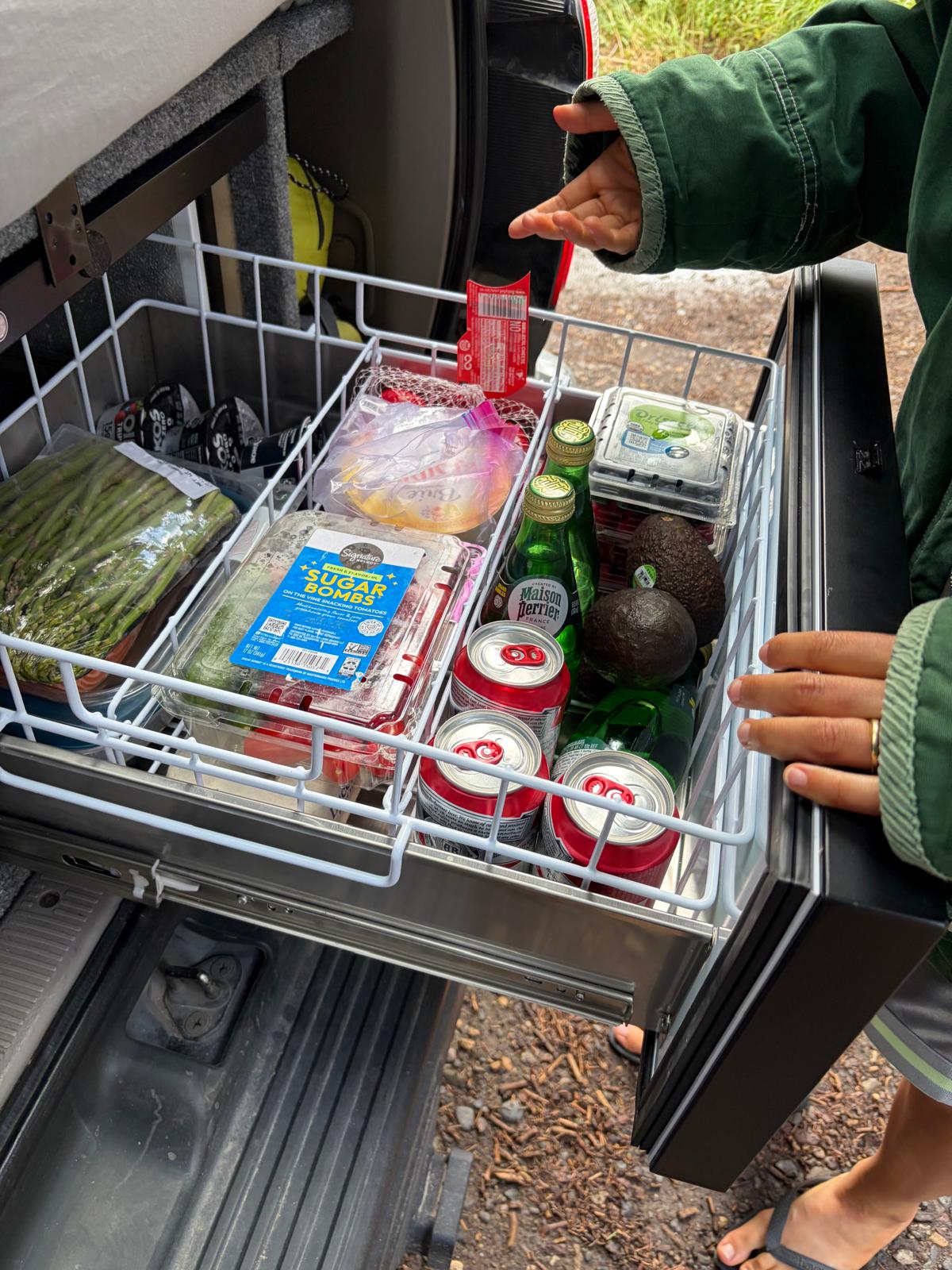 Ironman 4x4 IceCube 40L 12V fridge/freezer drawer pulled out and stocked with fresh food and drinks — photo 10