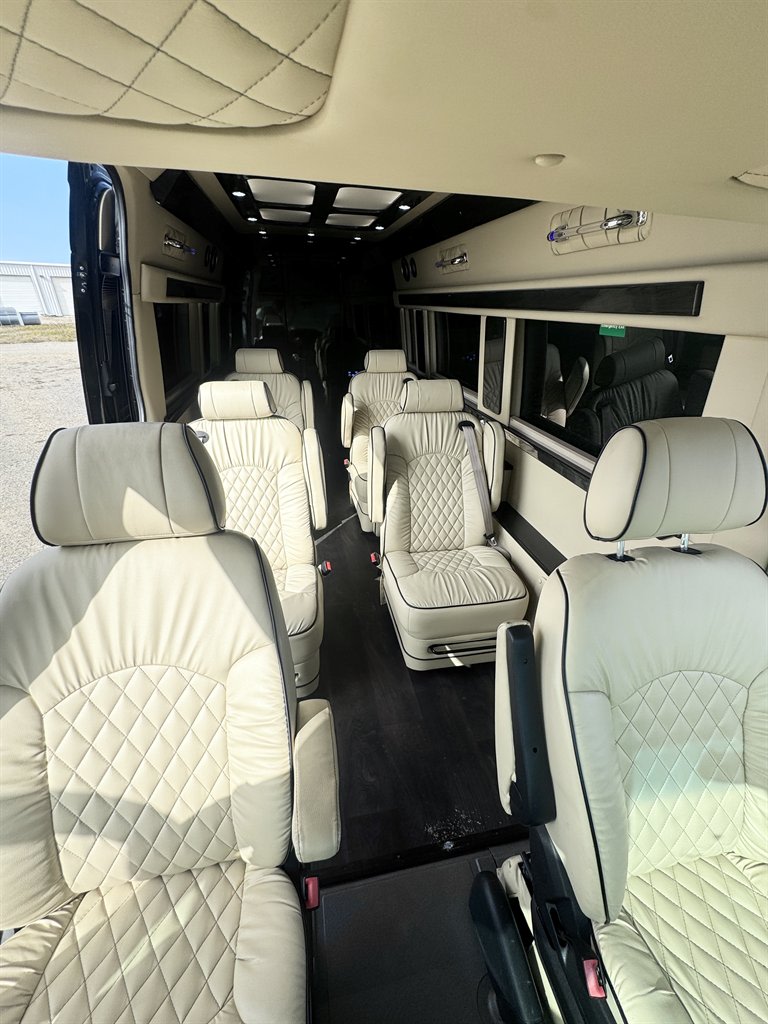 luxurious rv rental interior with cream leather seating