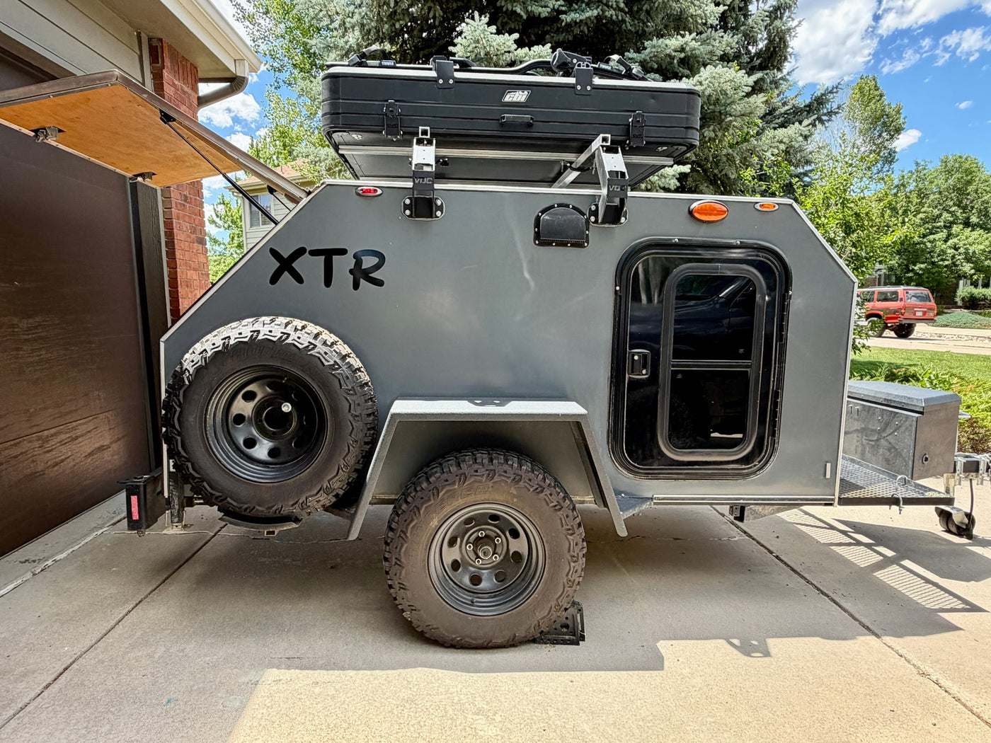 Rugged XTR off-road teardrop camper with rooftop tent & spare tire, ready for your next rv rental adventure. — photo 10
