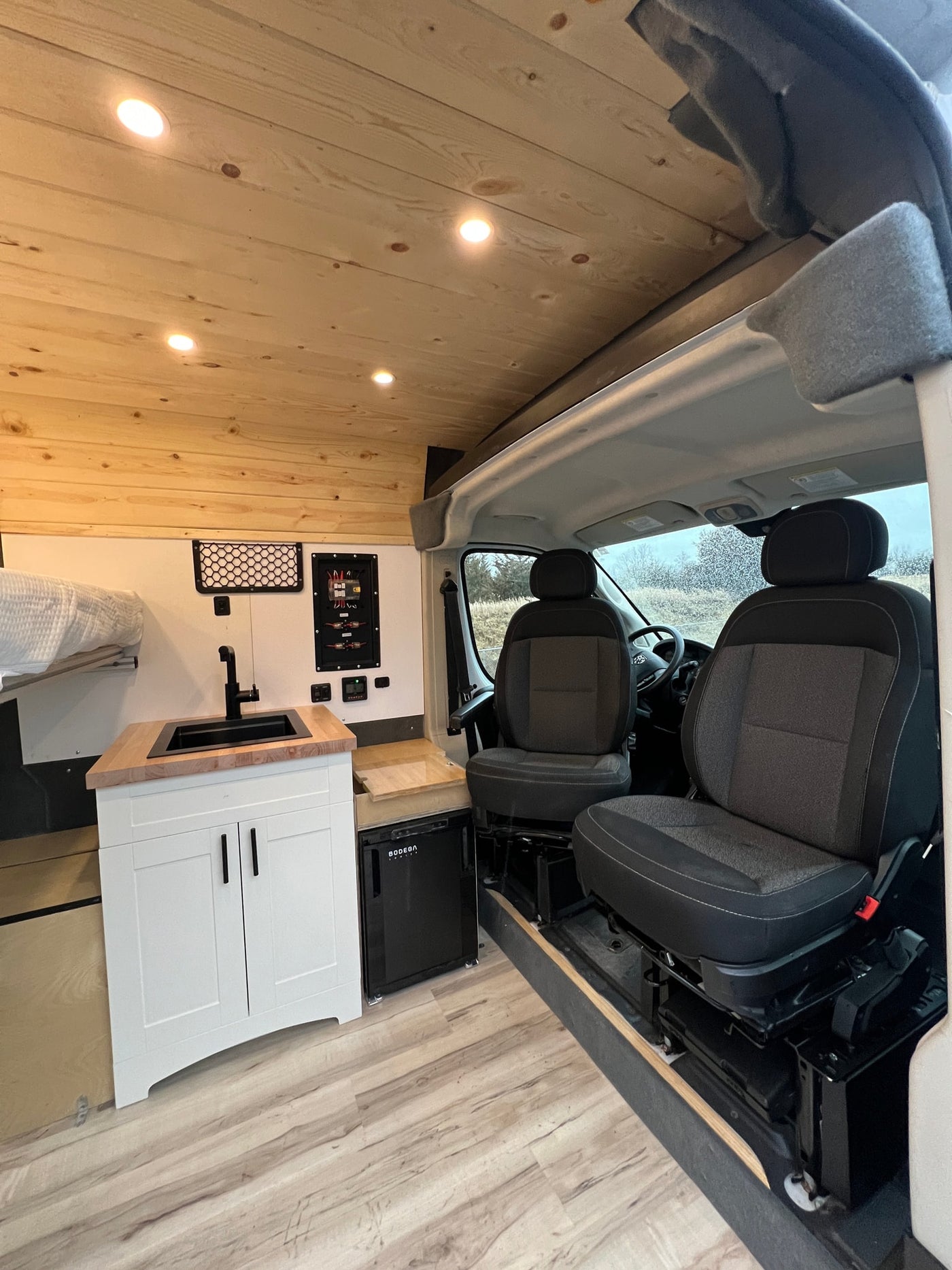 and storage. Perfect for adventure.|RV rental interior: bed platform — photo 11
