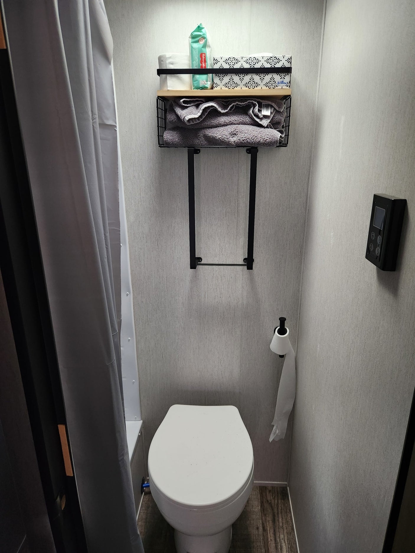 and two windows.|RV rental interior featuring bunk beds