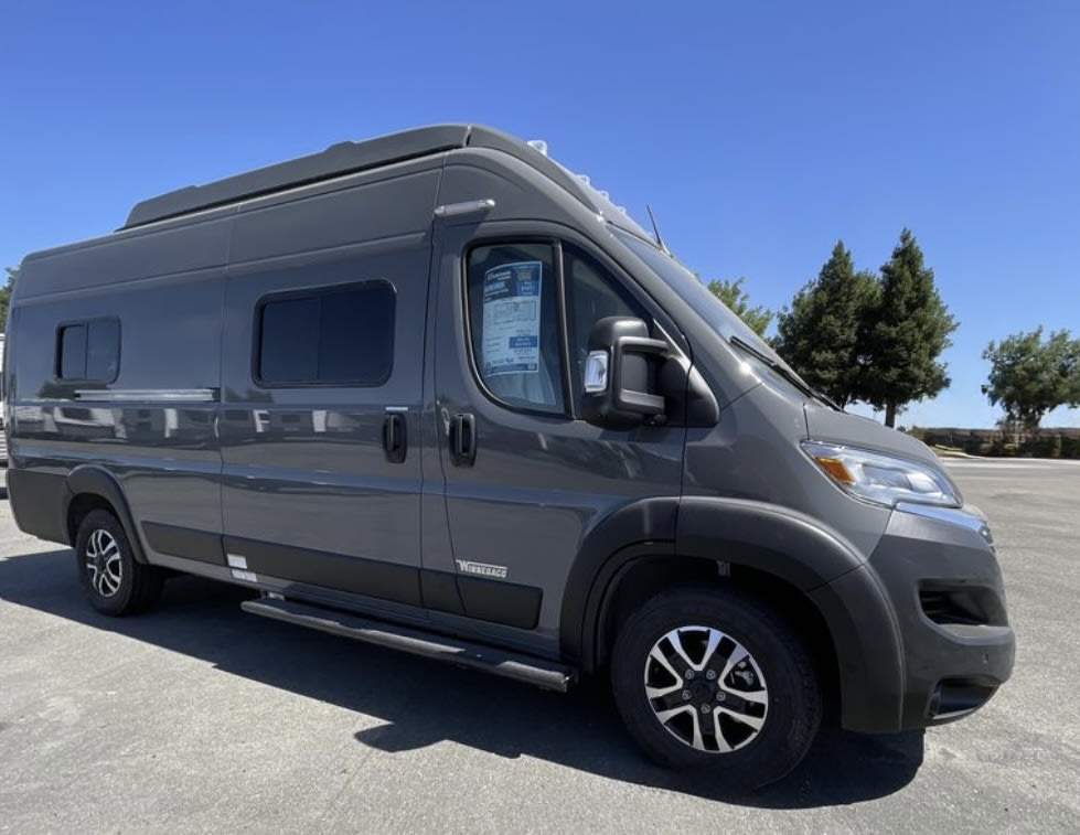 and window view.|Explore this RV rental floor plan! Features Murphy bed