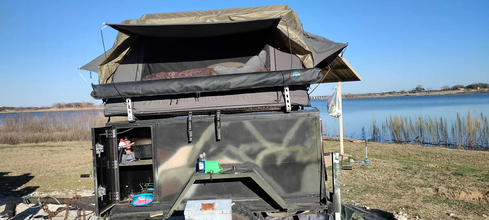 an off-road trailer with rooftop tent