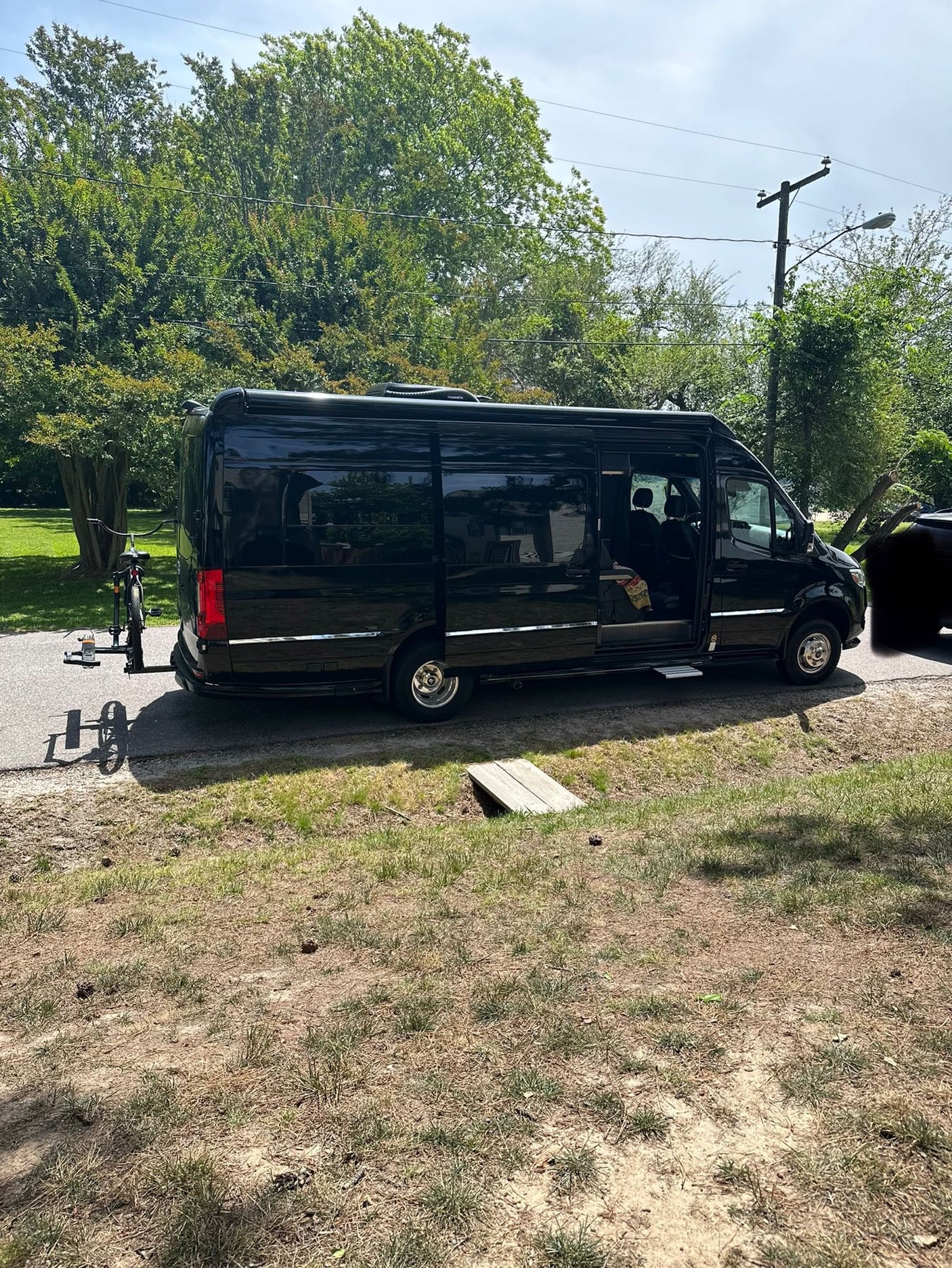 and comfortable leather seating.|Spacious RV rental interior with black leather seating
