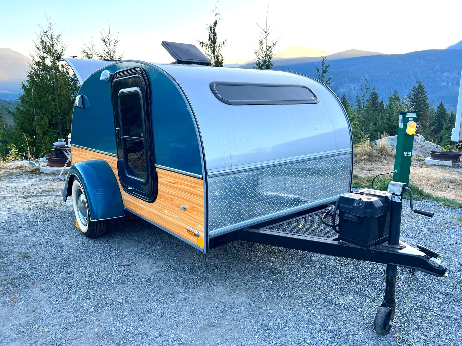 Teardrop RV rental parked at a scenic mountain campsite (29) with trees