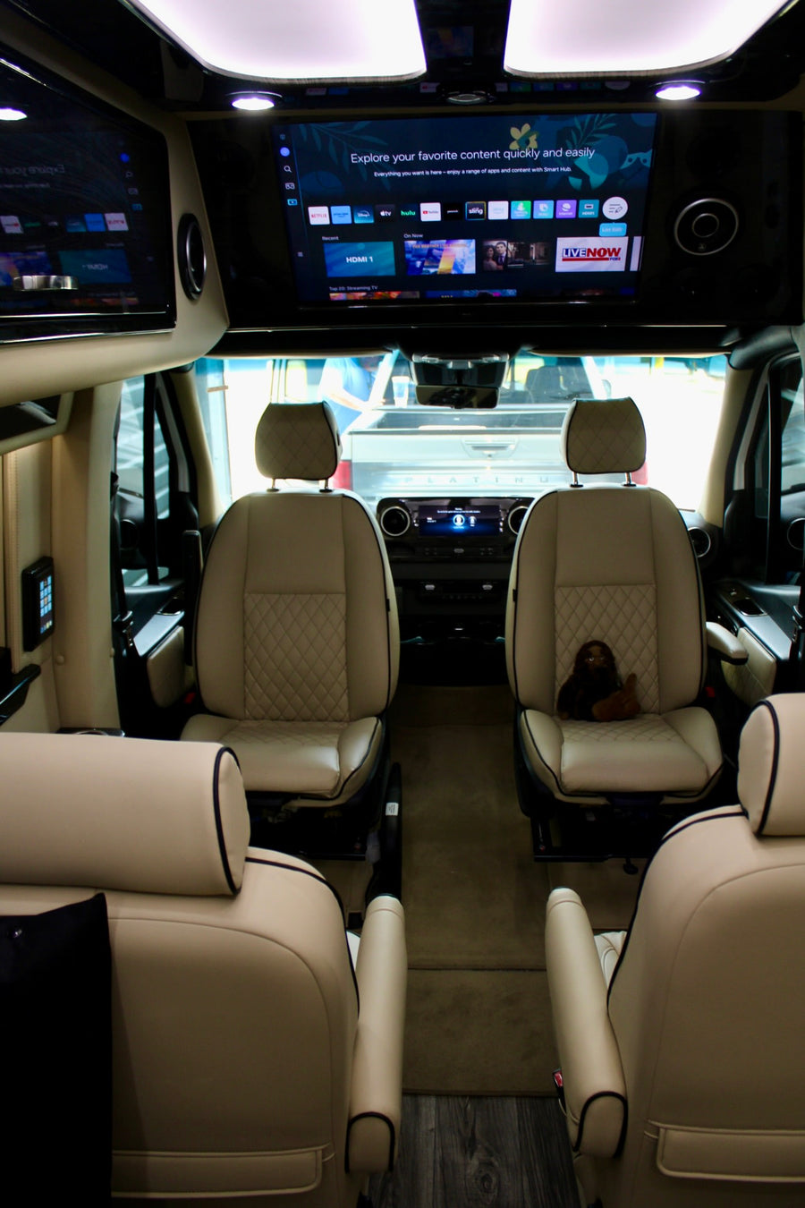 and a Mercedes-Benz cockpit.|Digital touchscreen light master panel in a luxury RV rental