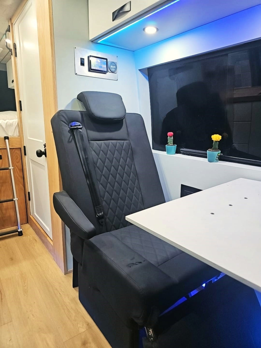 and portable toilet.|Step inside this RV rental! Features driver/passenger seats