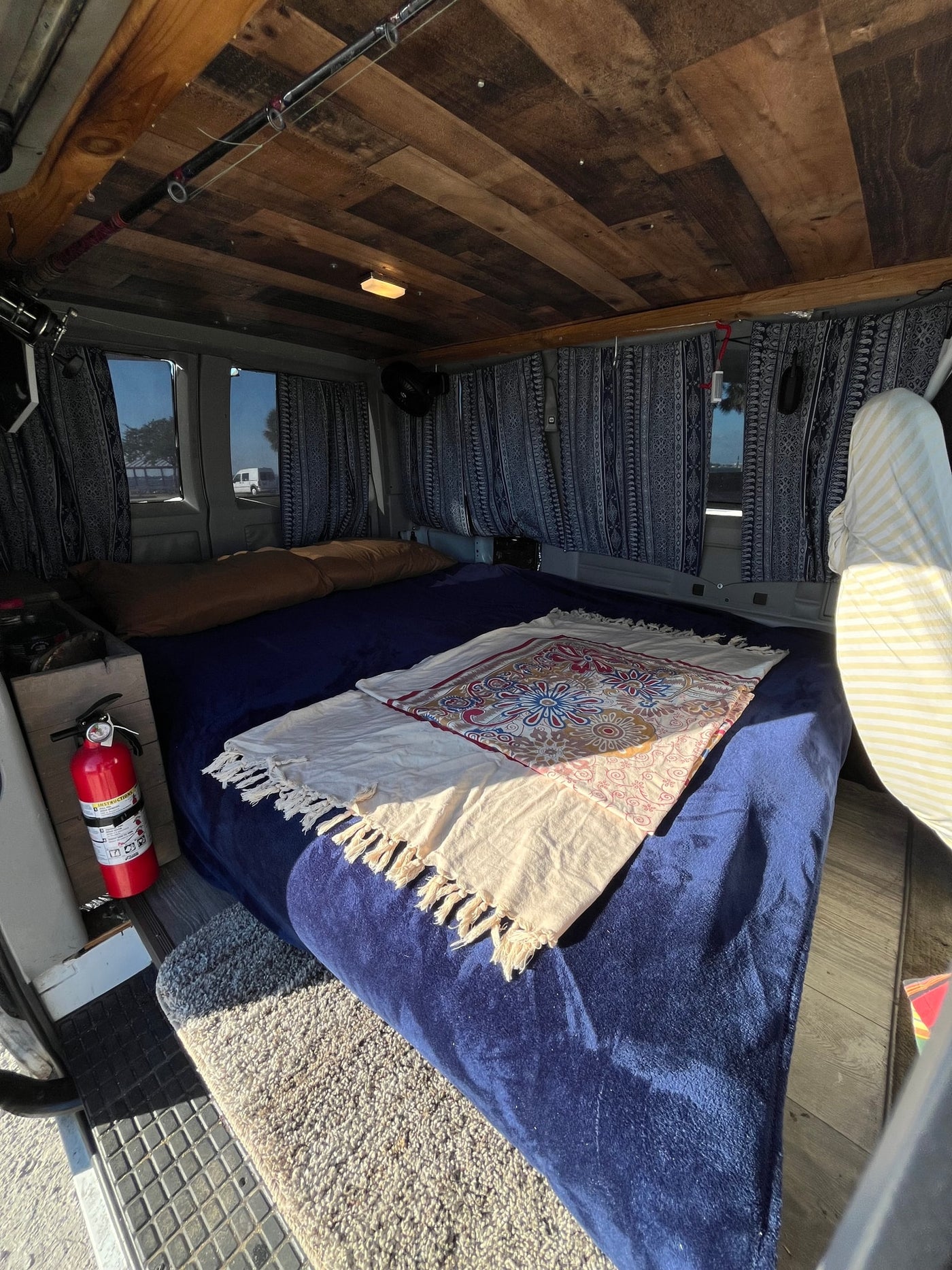 clear day.|Cozy rv rental van interior with bed — photo 8
