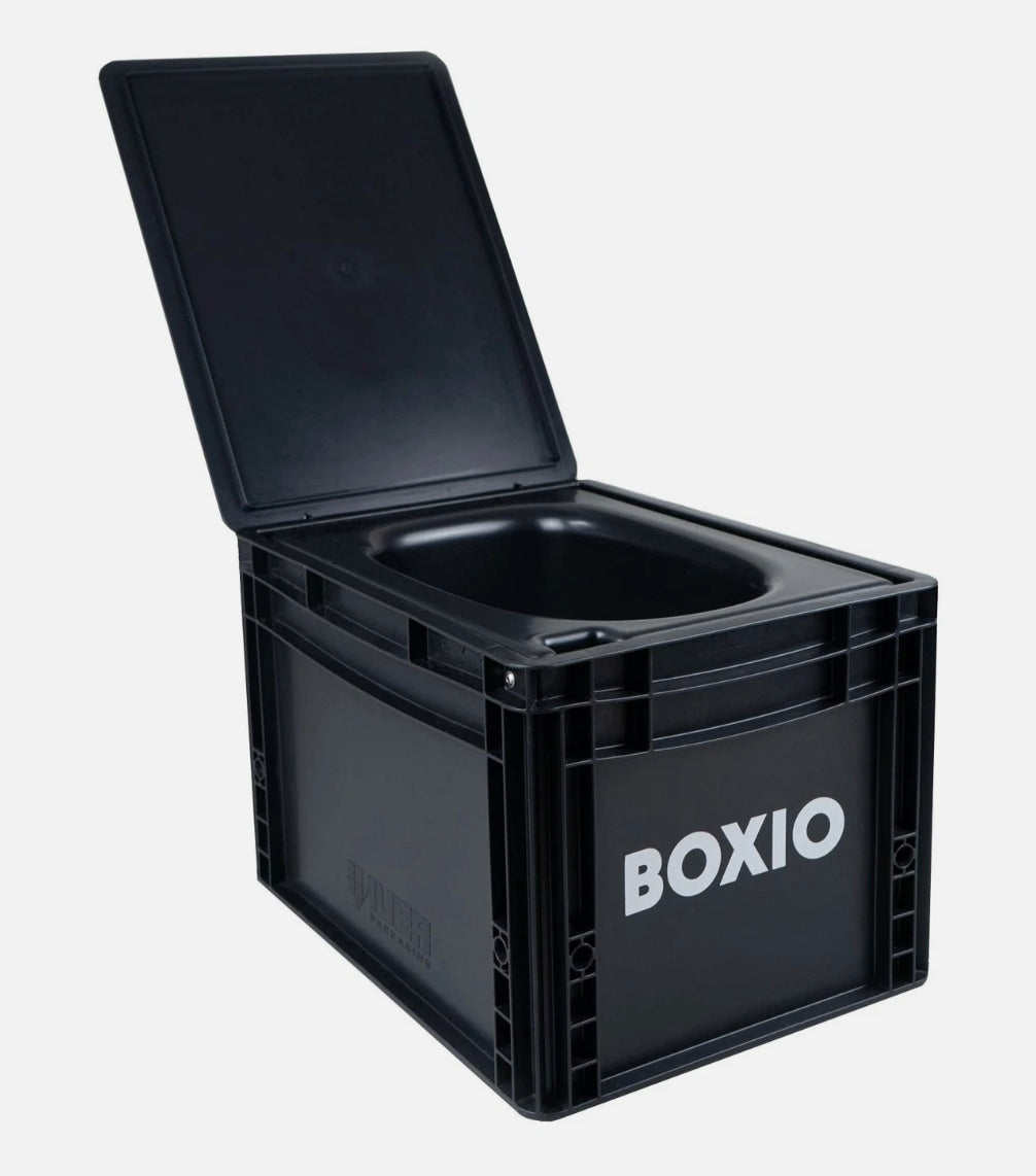 Black BOXIO portable compost toilet with open lid, ideal for RV rental camping & outdoor adventures.