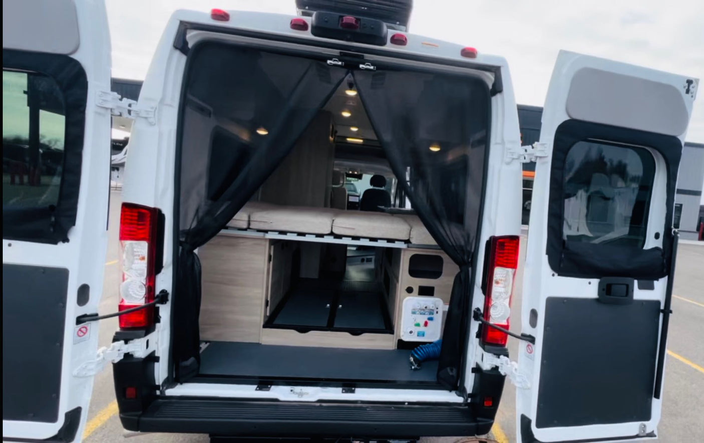 doors open to reveal an elevated bed