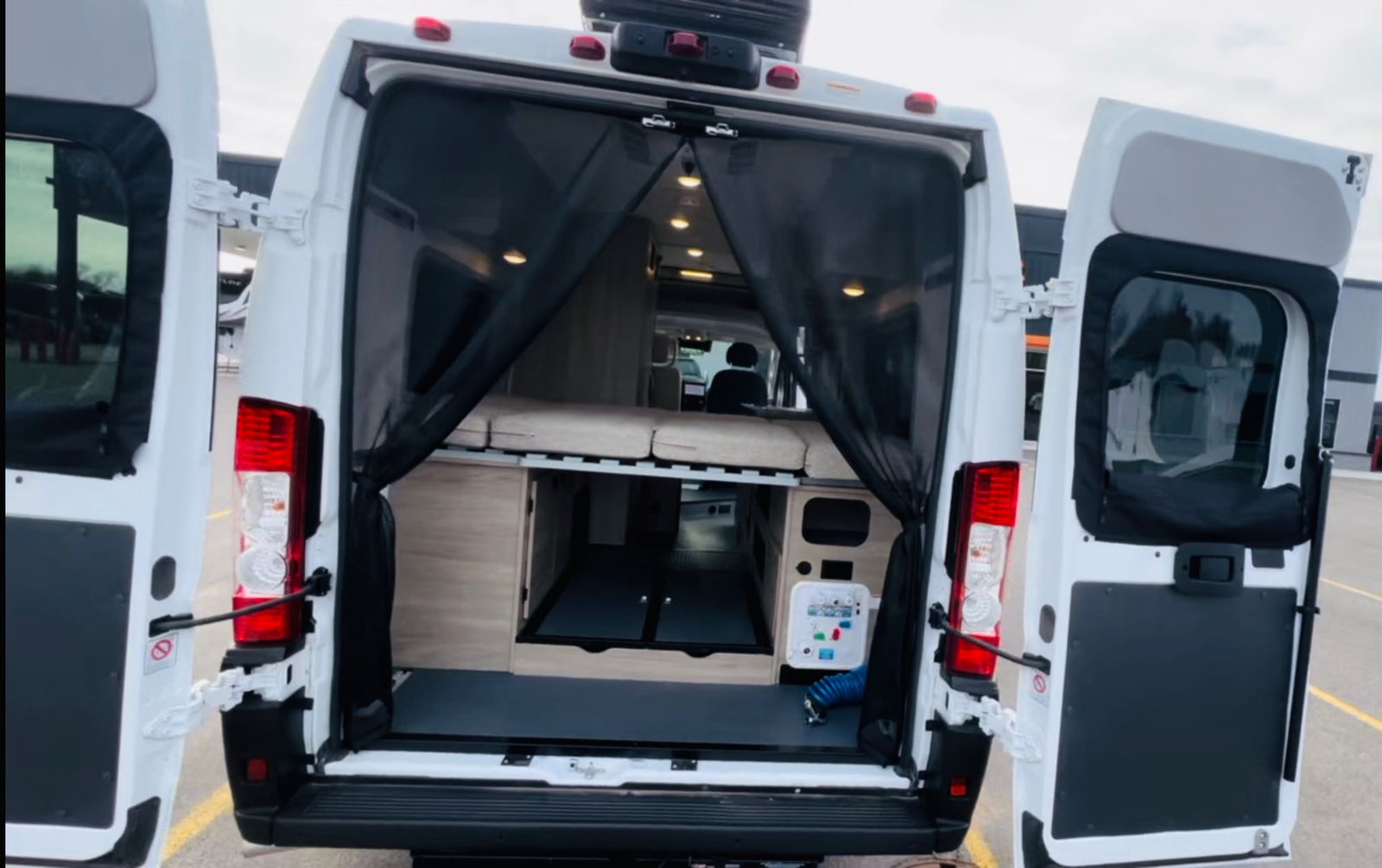 doors open to reveal an elevated bed