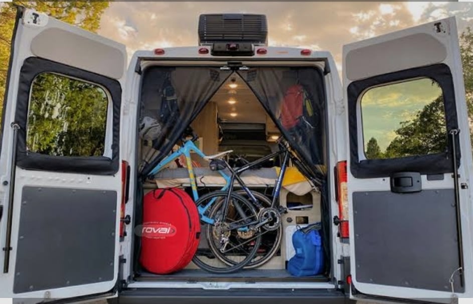 and phone management.|An RV rental van's 360-degree camera aids parking