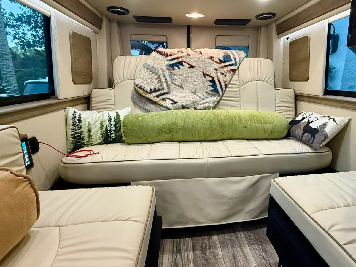 perfect for an rv rental trip.|White Sprinter RV rental with bike rack carrying two mountain bikes & extended awning. Ready for travel!|Explore this modern rv rental interior! Featuring a sleek galley — photo 6