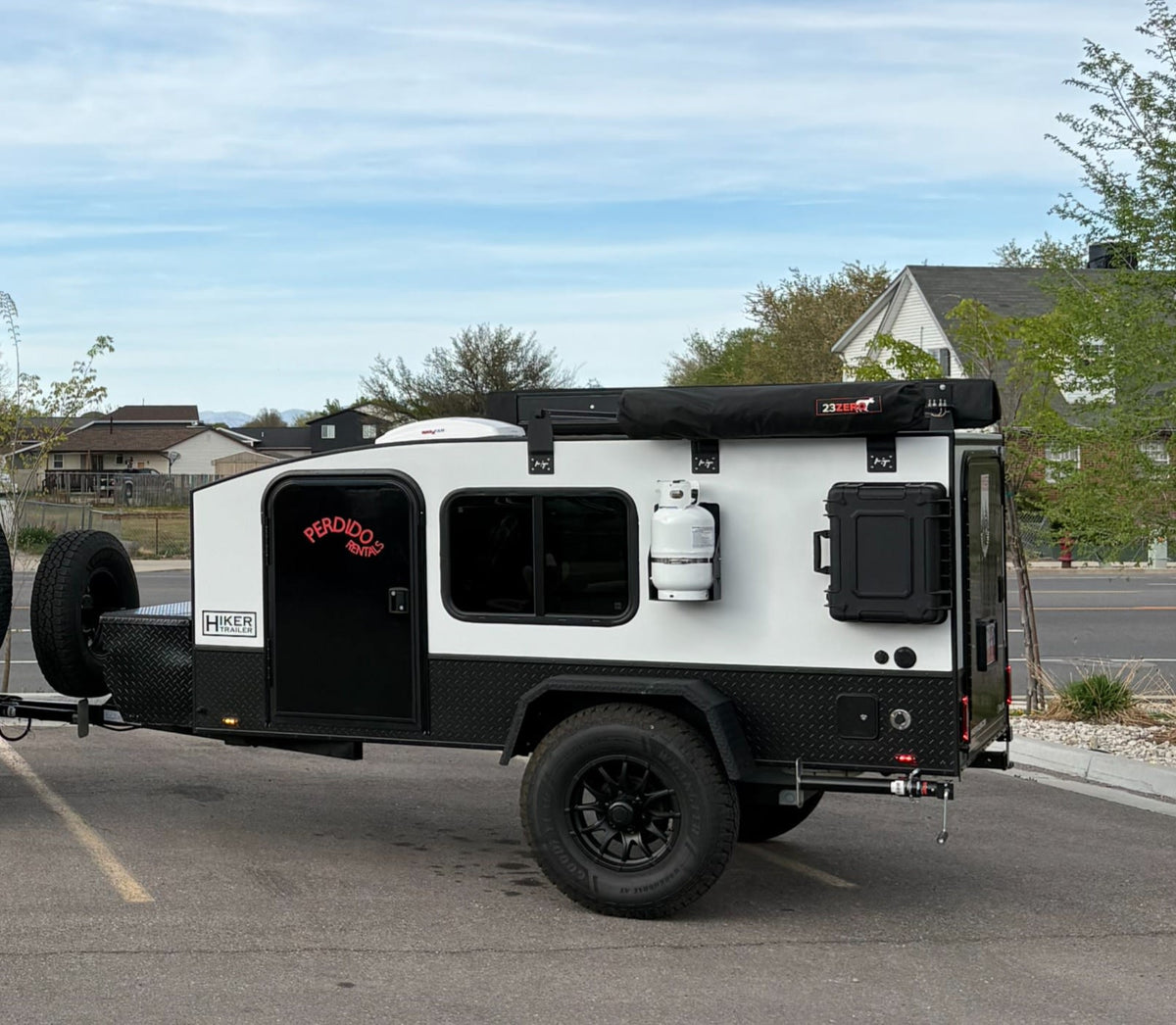 ready for outdoor adventure.|Explore the outdoors with this off-road Hiker Trailer camper RV rental from Perdido Rentals. Ready for your next adventure!|RV rental interior features cozy bunk beds — photo 2
