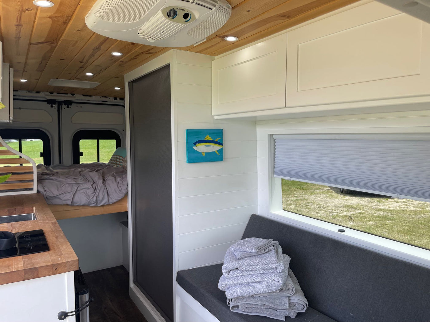 inviting outdoor adventures.|Spacious RV rental features a full kitchenette — photo 2