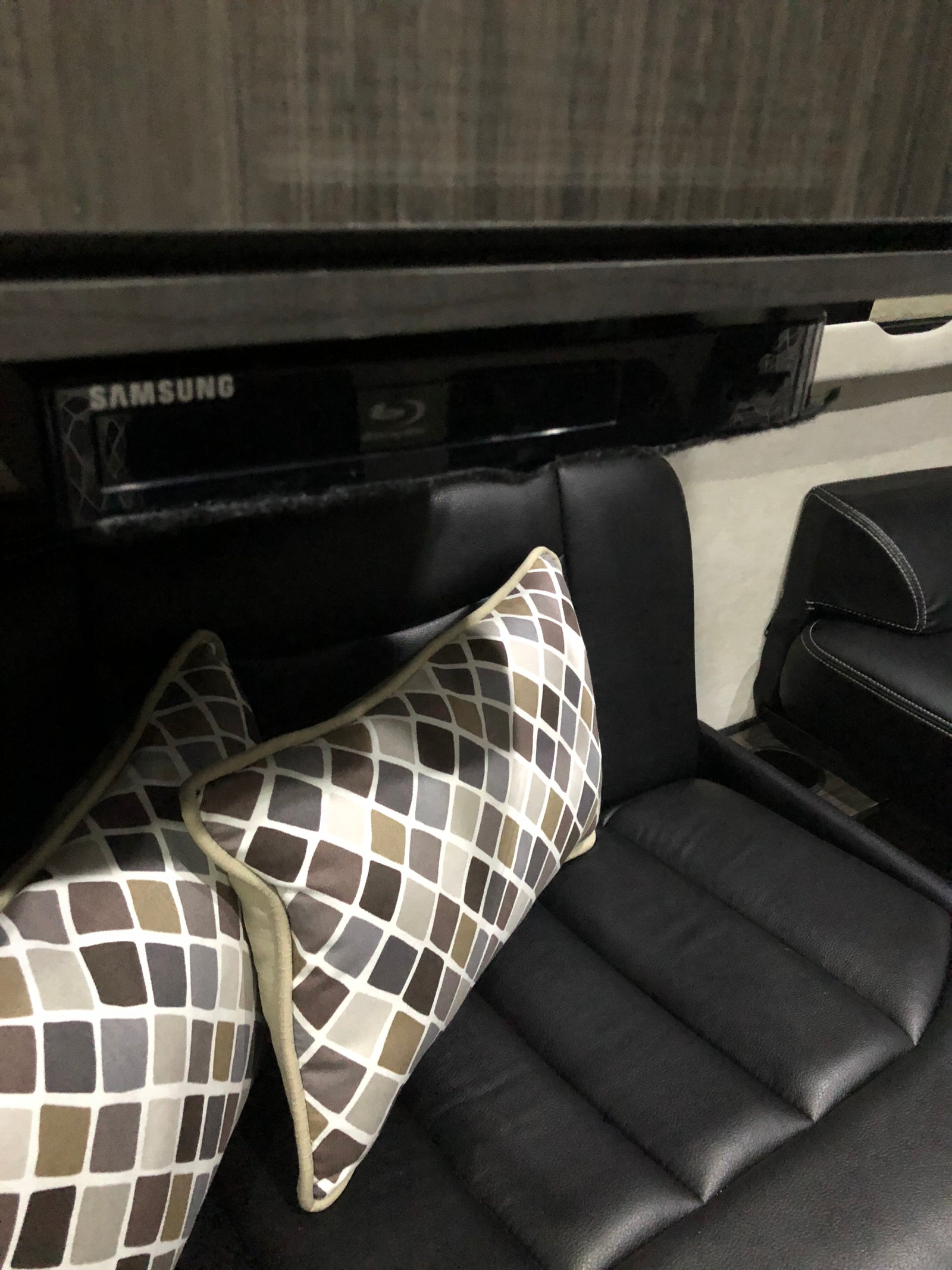 and a sleek kitchenette.|Inside a luxurious **RV rental**