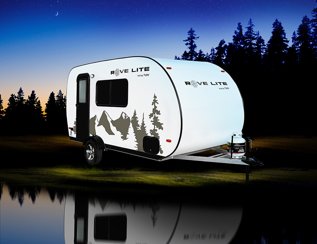 compact rv rental interior featuring a kitchen with sink
