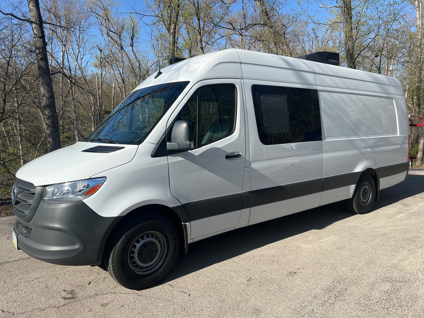 perfect for rv rental adventures.|Front view of a white Mercedes-Benz Sprinter van