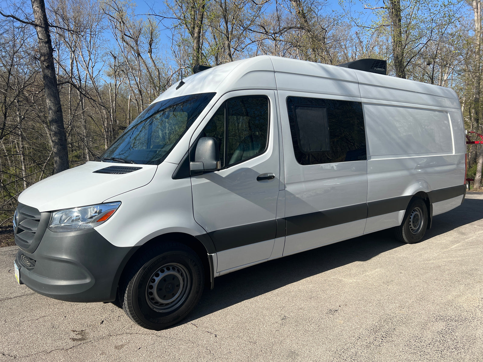 perfect for rv rental adventures.|Front view of a white Mercedes-Benz Sprinter van