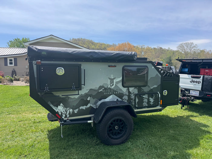 Rugged Mission Overland teardrop camper, perfect for rv rental, ready for overlanding and outdoor adventures.