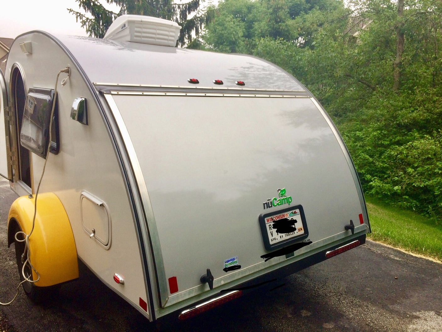 and a large cooler.|Compact rv rental camper kitchen