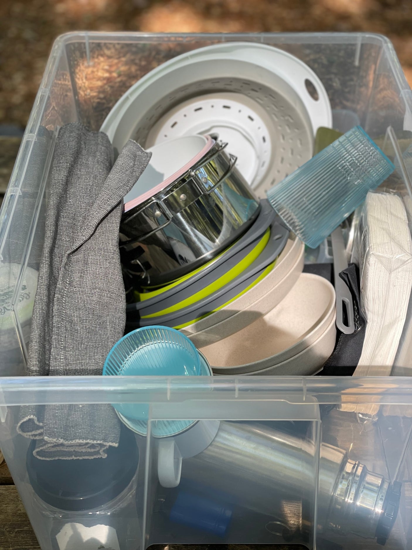 and an empty lighted compartment for camping food storage.|Portable fridge inside an RV rental