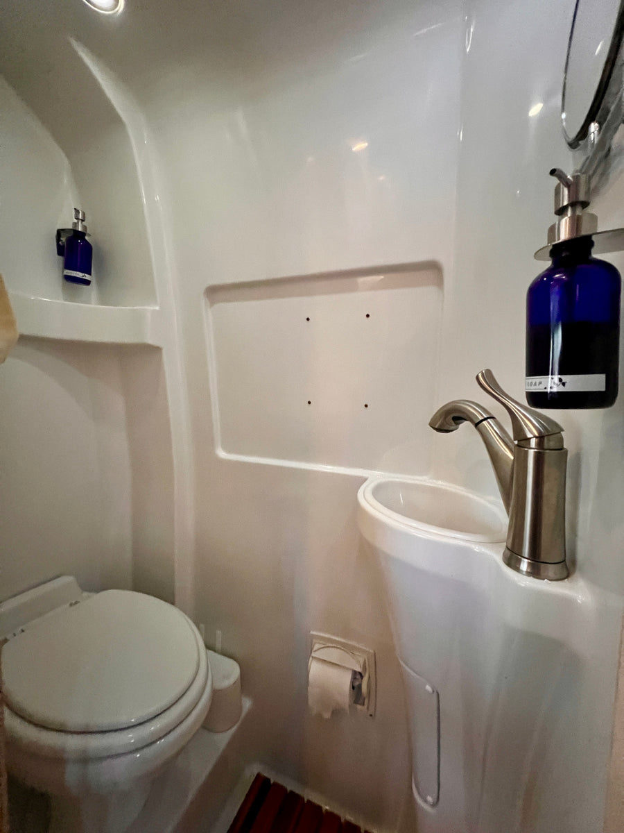 or campervan adventure.|A white and black Mercedes Sprinter van