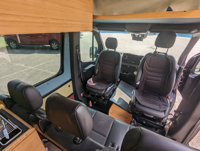 ready for adventure.|Spacious RV rental interior: front driver & passenger seats