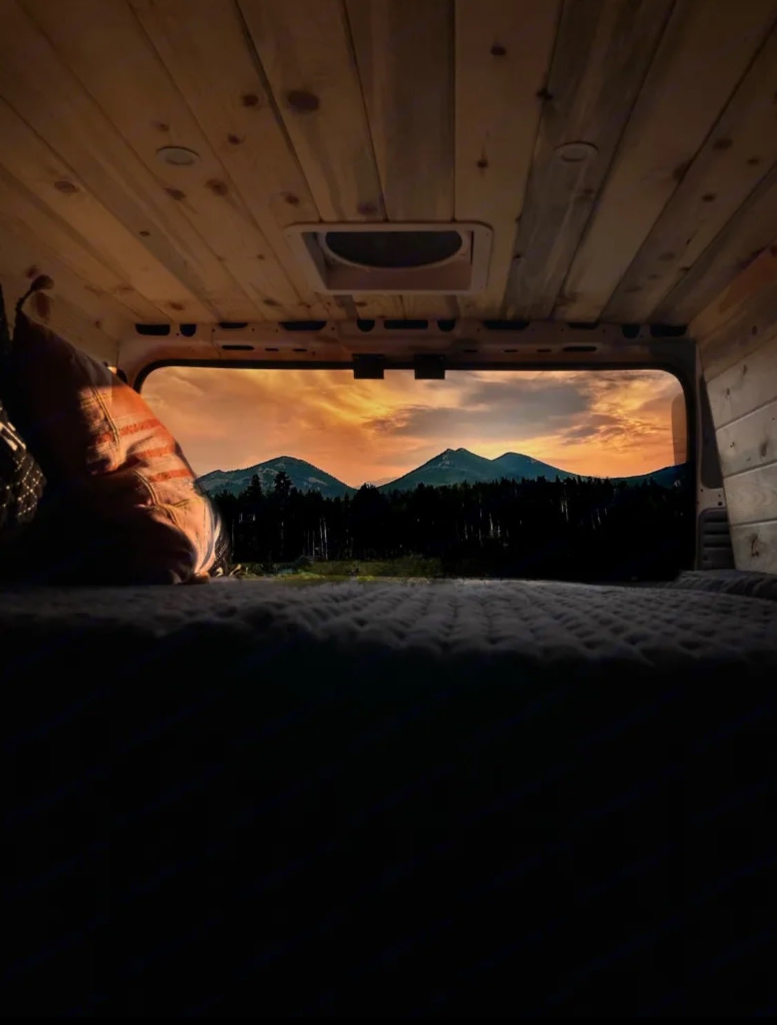 enjoying scenic layered mountains. Ultimate outdoor getaway!|RV rental: Inside a cozy