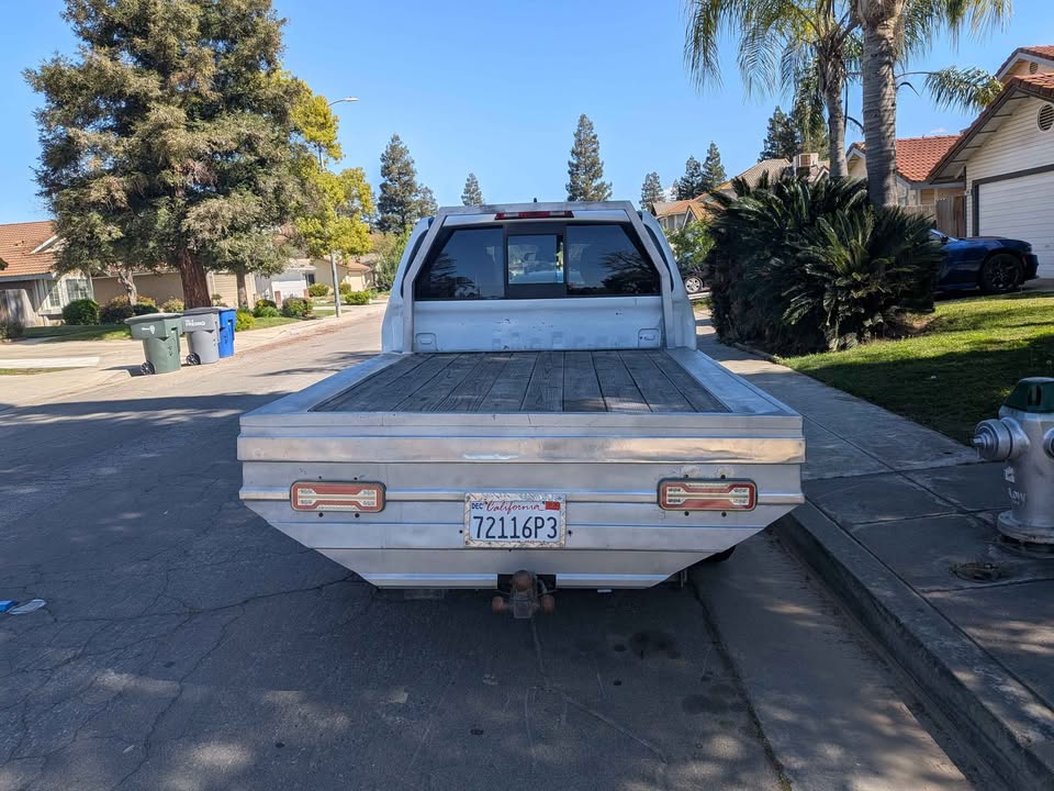 2023 Nissan Frontier Crew Cab · LE Pickup 4D 5 ft in Fresno, CA (photo 4) — photo 4