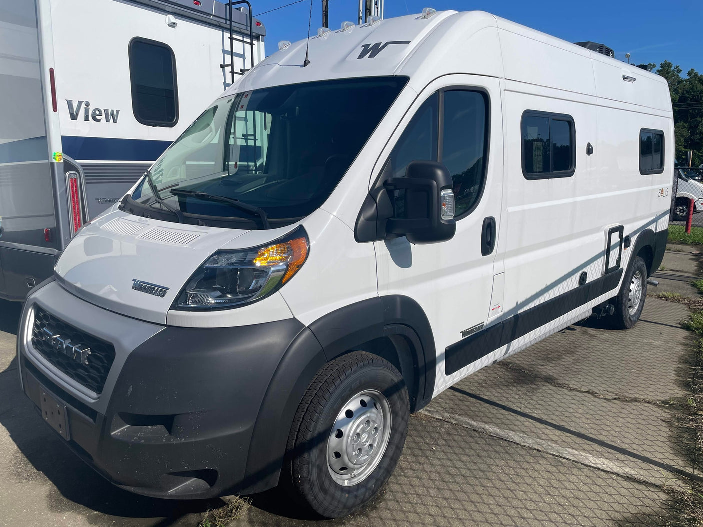 White Winnebago Solis camper van for rv rental. Another RV