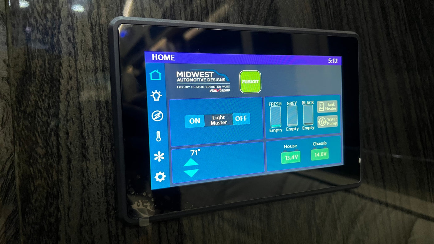 RV rental's smart panel shows home controls: empty tanks, 71° temperature, and battery stats (House 13.4V, Chassis 14.0V).