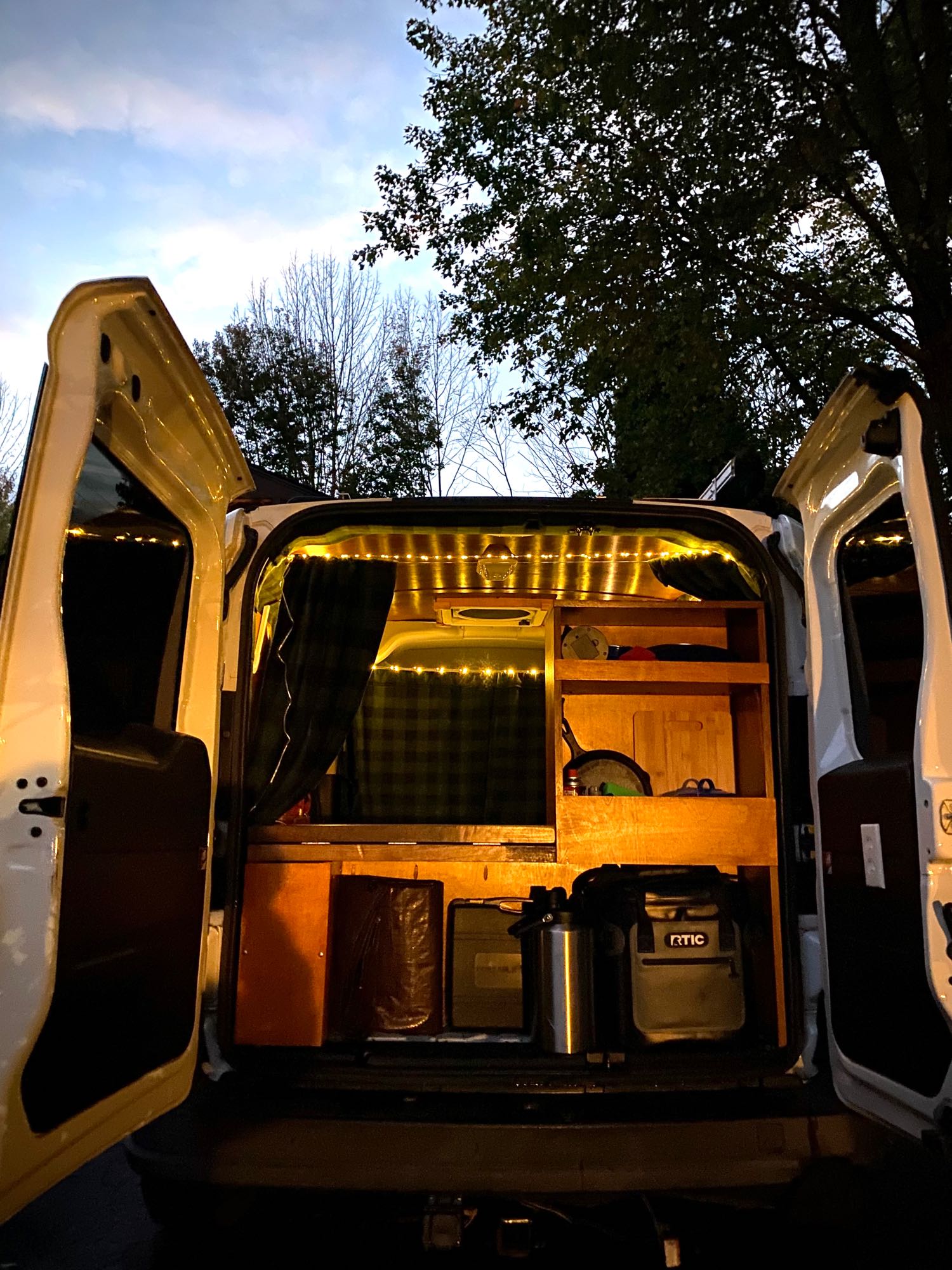 Cozy camper van interior seen from the rear