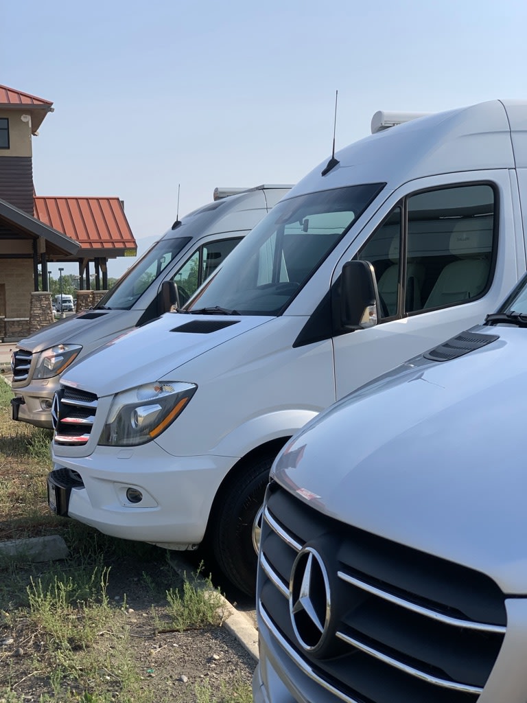 Several Mercedes-Benz Sprinter vans