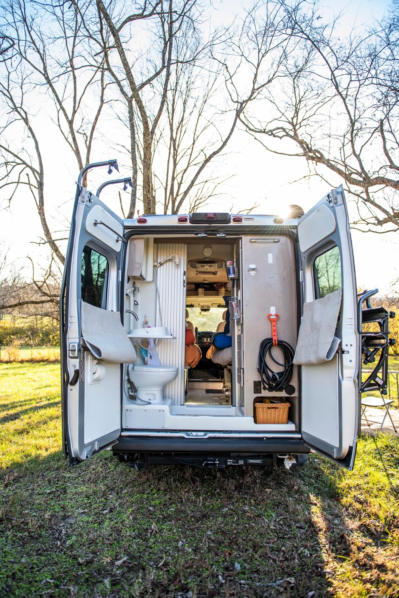 Explore this RV rental's versatile interior with a built-in toilet and shower, ideal for mobile adventures.
