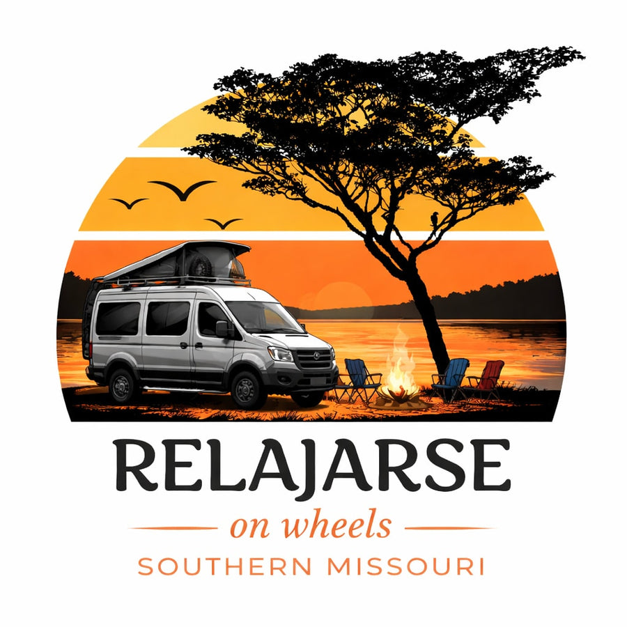 RV rental in Southern Missouri: A camper van by a sunset lake with a campfire