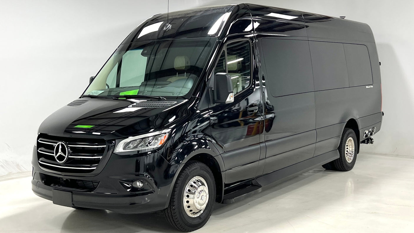 Experience luxury travel in this black Mercedes-Benz Sprinter camper van, ideal for rv rental. Sleek and polished.