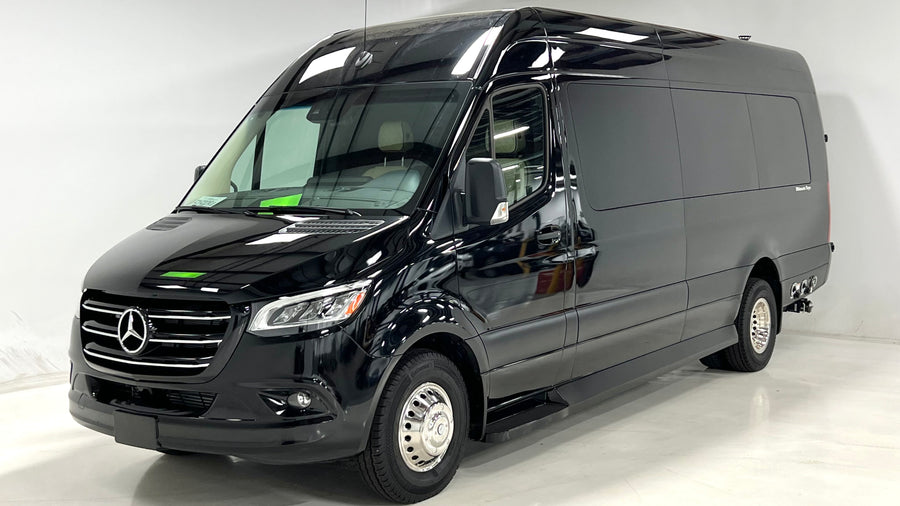 Experience luxury travel in this black Mercedes-Benz Sprinter camper van, ideal for rv rental. Sleek and polished.