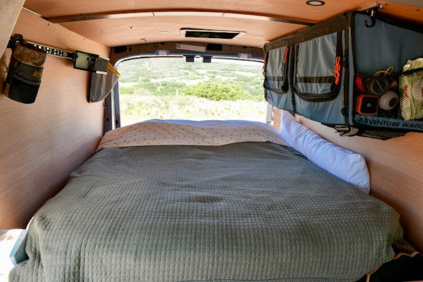 and gear for adventure.|RV rental adventure van interior: efficient gear storage — photo 3