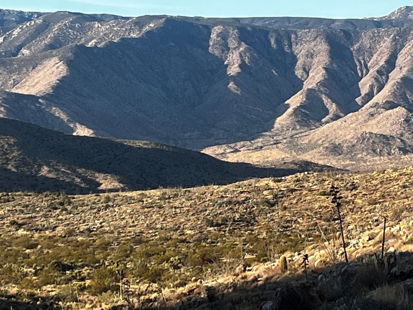 ready for rugged winter camping adventures.|Adventure-ready **rv rental** off-road camper at a sandy desert campsite during sunset