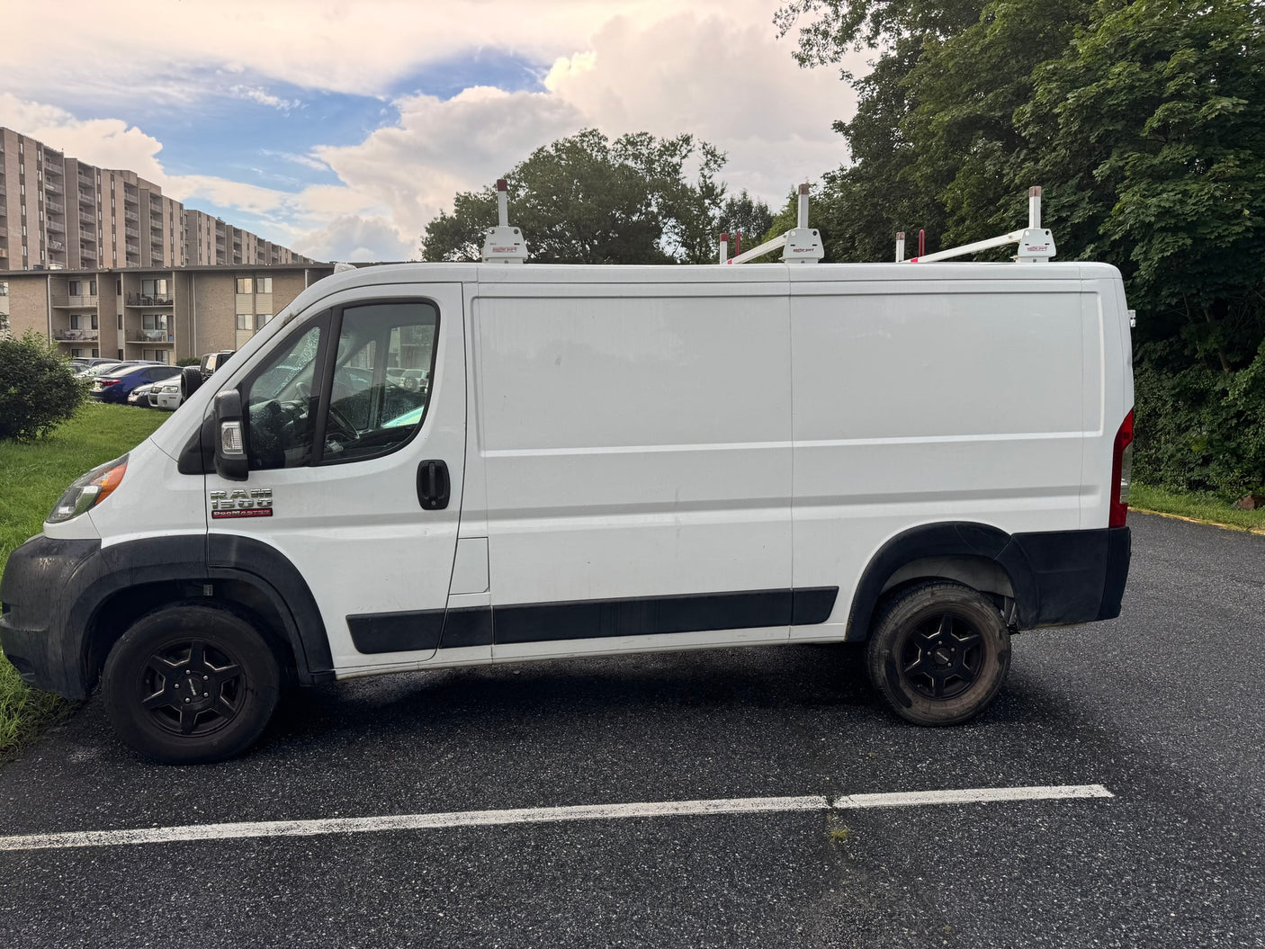 with a Maryland plate 4GM6845 & ladder rack.|White Ram ProMaster van for rv rental conversion
