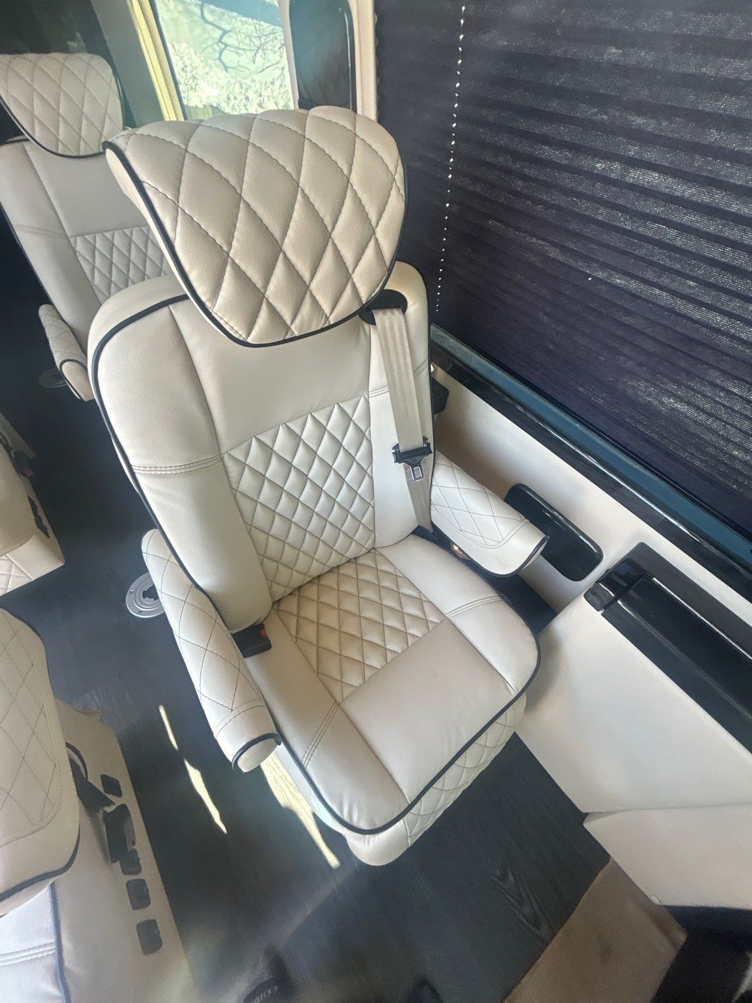 designed for road trip comfort.|RV rental interior: A modern galley features a stainless microwave