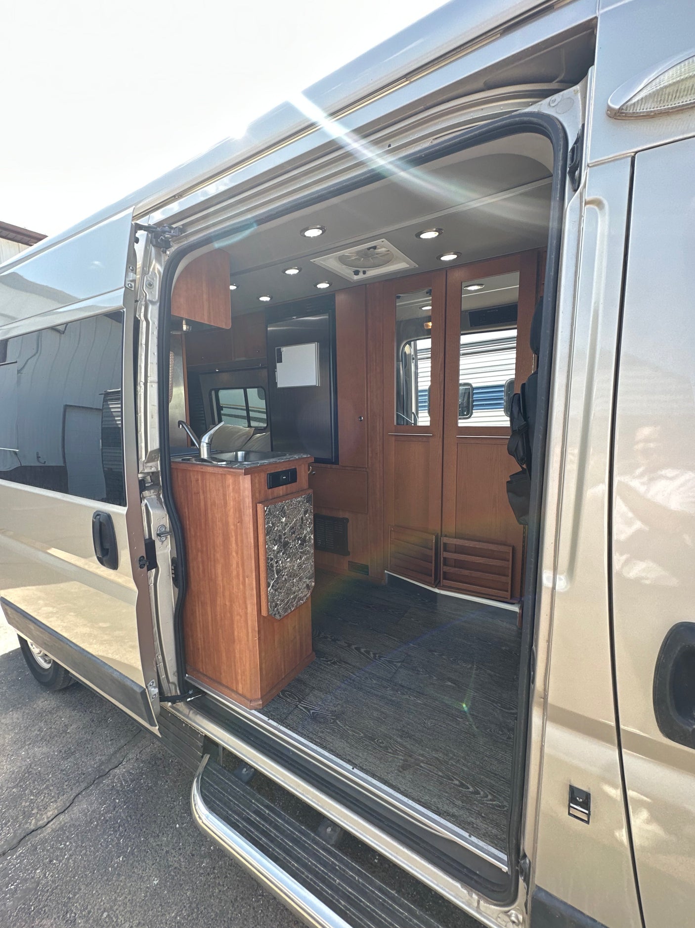 and lighting. Ideal for travel accommodations.|Driver's view from an rv rental van