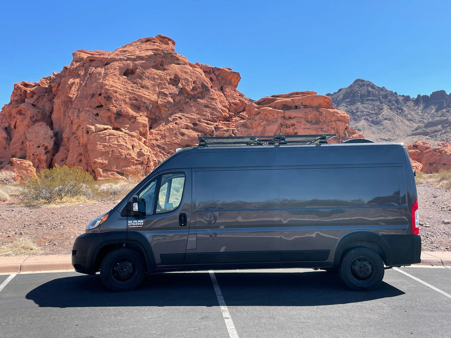 ideal for stargazing and adventure travel.|RV rental's mobile office with a laptop editing photos