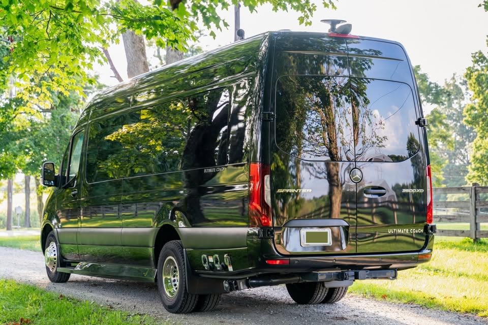 & dark privacy blinds.|Black Mercedes Sprinter RV rental
